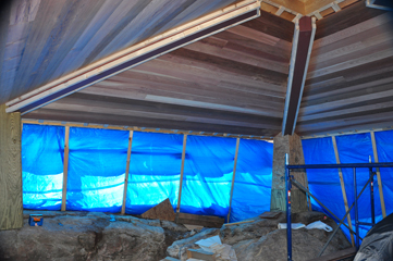 cedar on activity shelter roof The tongue and grove cedar has been attached to the roof and next Mark Becker will cap the hip beams with the same material