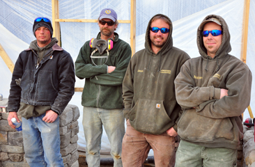 lee-bill-jason-nathan-from jorgensen Lee, Bill, Jason and Nathan pause for a photo after completing the greenhouse wall. Next they will begin the pillars that mark the entrance to the learning garden.