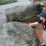Carole Hanson carved whales that spray for the Children's Garden entryway.