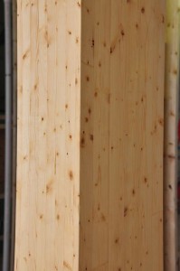 beam-detail The beams used in the frame construction are laminated strips of spruce/fir. cut from trees too small for typical dimensional lumber.