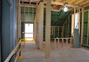 A view west down the hallway and door that will connect the new building with the visitor center via a pathway.